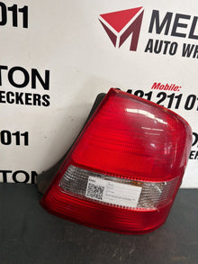 Sep 1998 to May 2002- Mazda 323 BJ Sedan- Right Taillight- Clear Type, Koito Lens# 220-61866