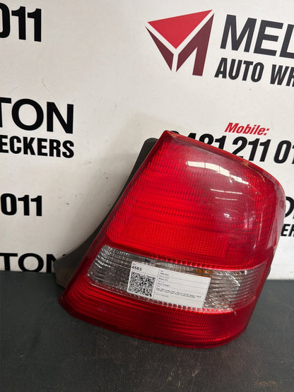 Sep 1998 to May 2002- Mazda 323 BJ Sedan- Right Taillight- Clear Type, Koito Lens# 220-61866