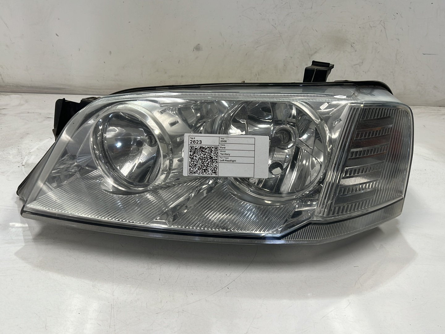 May 2004 to Apr 2009- Ford Territory SX SY MkI TS Ghia Ghia Turbo- Left Headlight- Chrome Insert