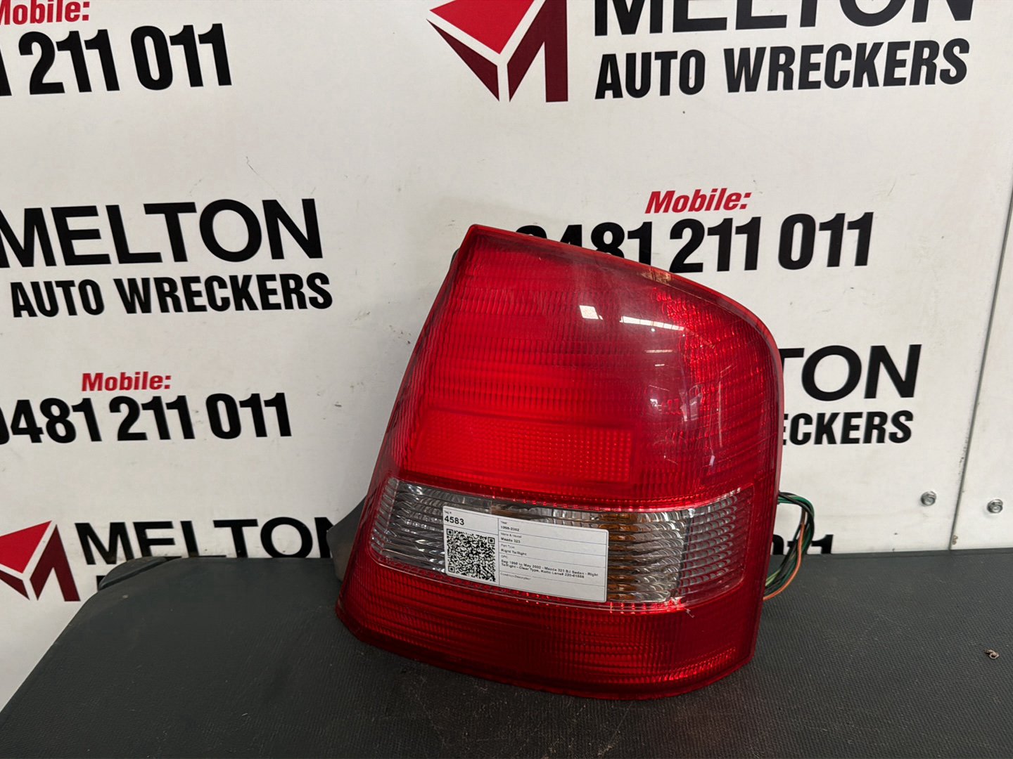 Sep 1998 to May 2002- Mazda 323 BJ Sedan- Right Taillight- Clear Type, Koito Lens# 220-61866