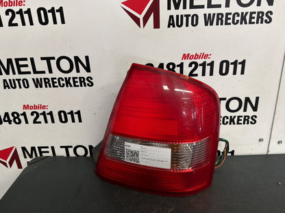 Sep 1998 to May 2002- Mazda 323 BJ Sedan- Right Taillight- Clear Type, Koito Lens# 220-61866