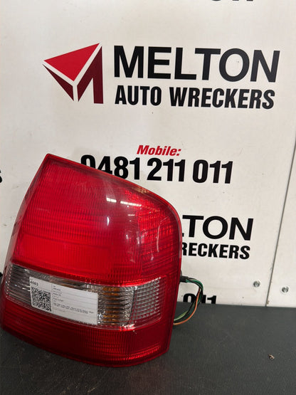 Sep 1998 to May 2002- Mazda 323 BJ Sedan- Right Taillight- Clear Type, Koito Lens# 220-61866
