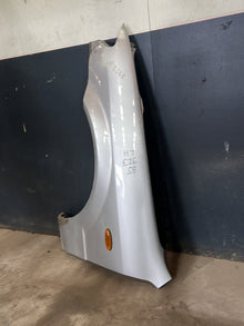 2000 Mazda 323 Left Front Guard