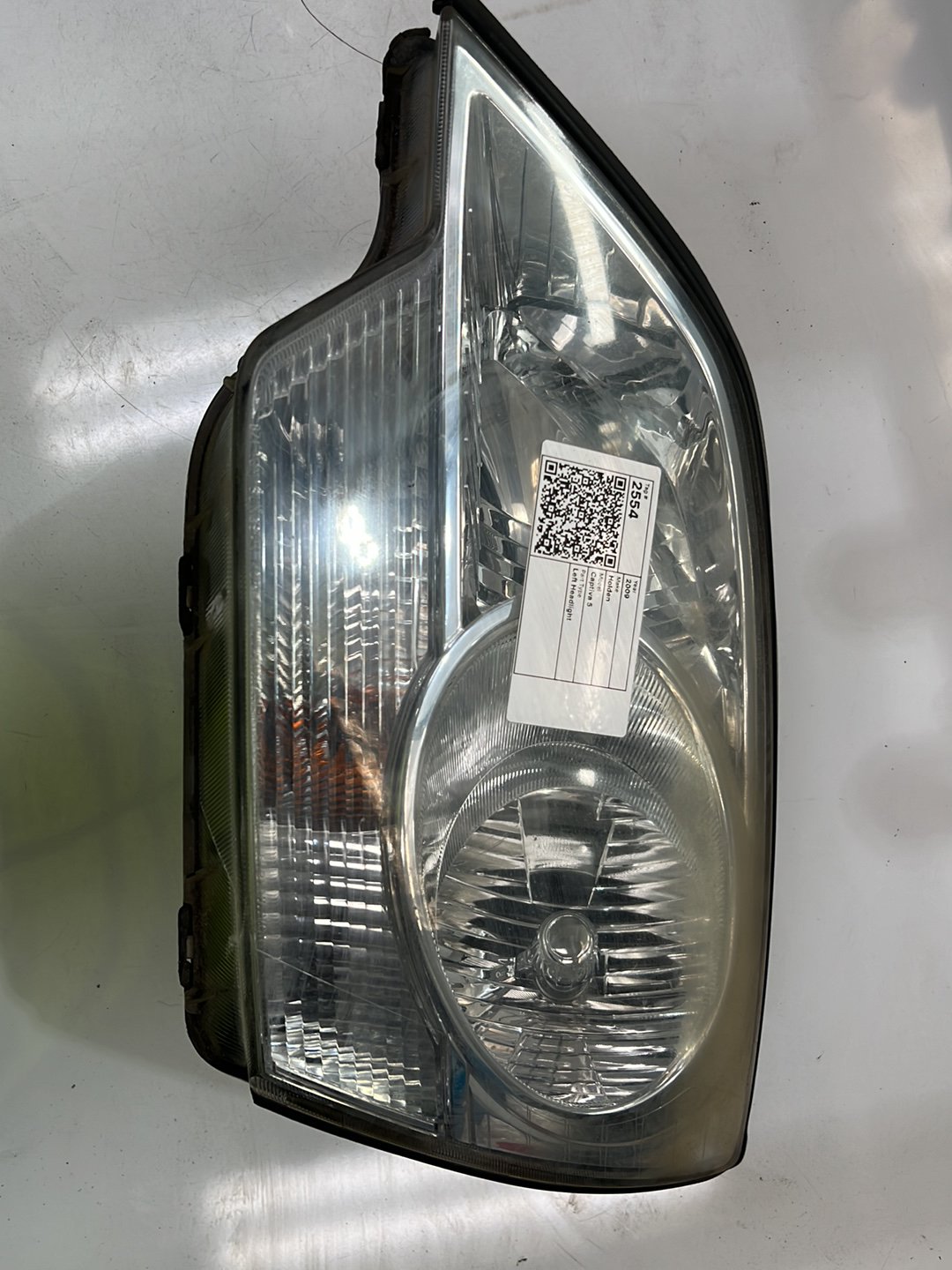 2009 Holden Captiva 5 CG - Left Headlight